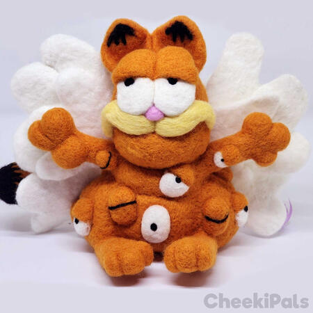 Biblically Accurate Garfield Needle felted figure of a biblically accurate Garfield, which has 3 sets of wings, multiple eyes over his body, and is doing that thing with the fingers that Catholic art does.